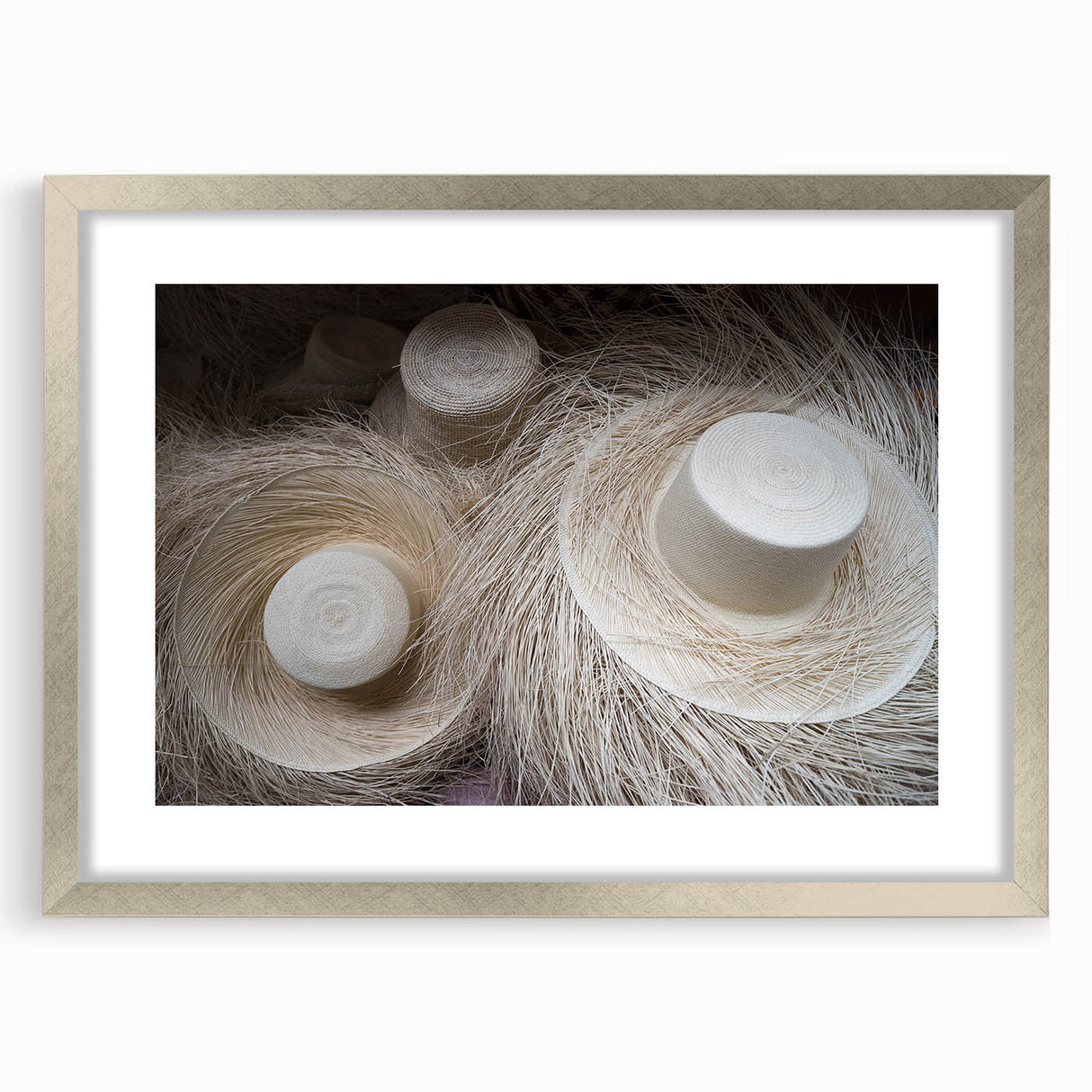 Textured abstract art print of Central American scenery in muted earth tones on a framed silver mat, ideal for bedroom art.