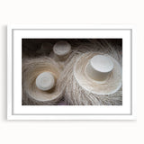 Abstract art print depicting a colorful Central American scenery on a framed white mat, ideal for dining room decor.