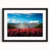 Extra large abstract art print of a colorful, textured Austrian landscape on a black-framed canvas.