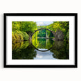 Abstract art print featuring a vibrant, colorful depiction of a European scenery on a large textured canvas, framed in black.