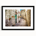 Extra large abstract art print of colorful, textured European scenery on a framed black mat, ideal for living room decor.