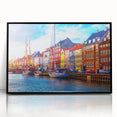 Large abstract wall art depicting a European scenery in muted earth tones on a framed acrylic.