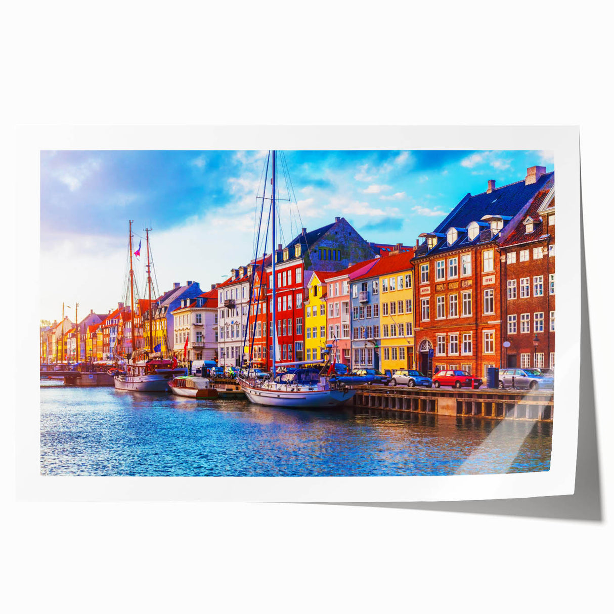 Rolled print of a Danish landscape with muted green and blue tones, ideal for dining room wall art.