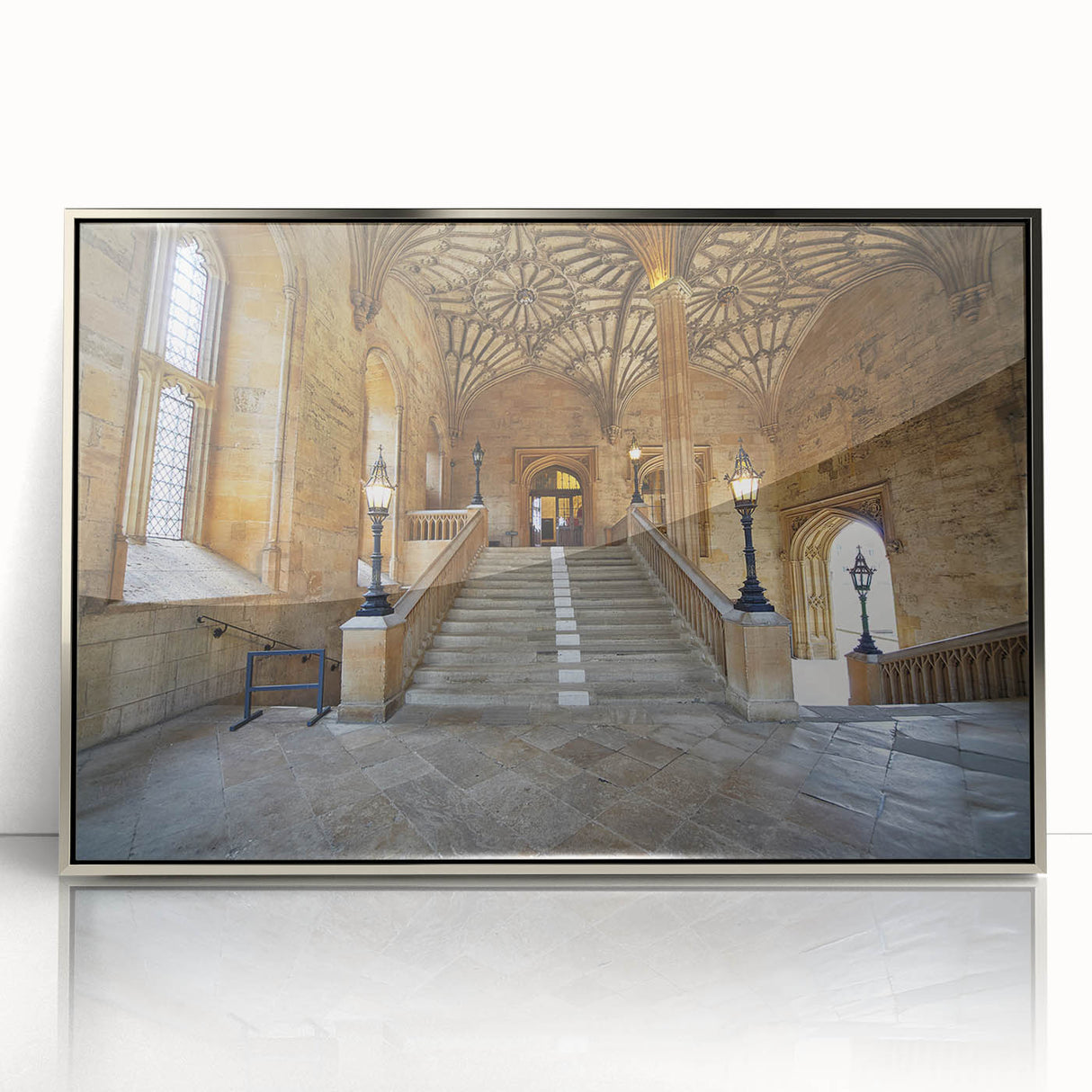 Acrylic print of Oxford skyline in muted earth tones, framed in silver, ideal for nursery wall art.