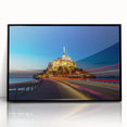 Large abstract wall art depicting a European scenery in muted colors on a black framed acrylic.