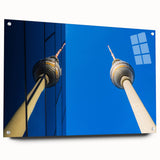 Acrylic print of Berlin cityscape featuring large abstract shapes in muted gray and blue tones.