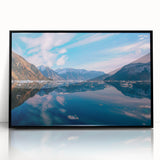 Large abstract wall art featuring a Greenlandic landscape in muted green and blue tones, framed in black acrylic.