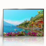 Large art print of Lake Como with soft blue and green hues, framed in silver acrylic, in a mid-century modernist style.