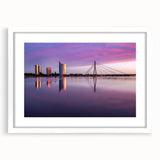 Textured abstract art print of a European landscape in muted earth tones on a framed canvas, ideal for bedroom decor.
