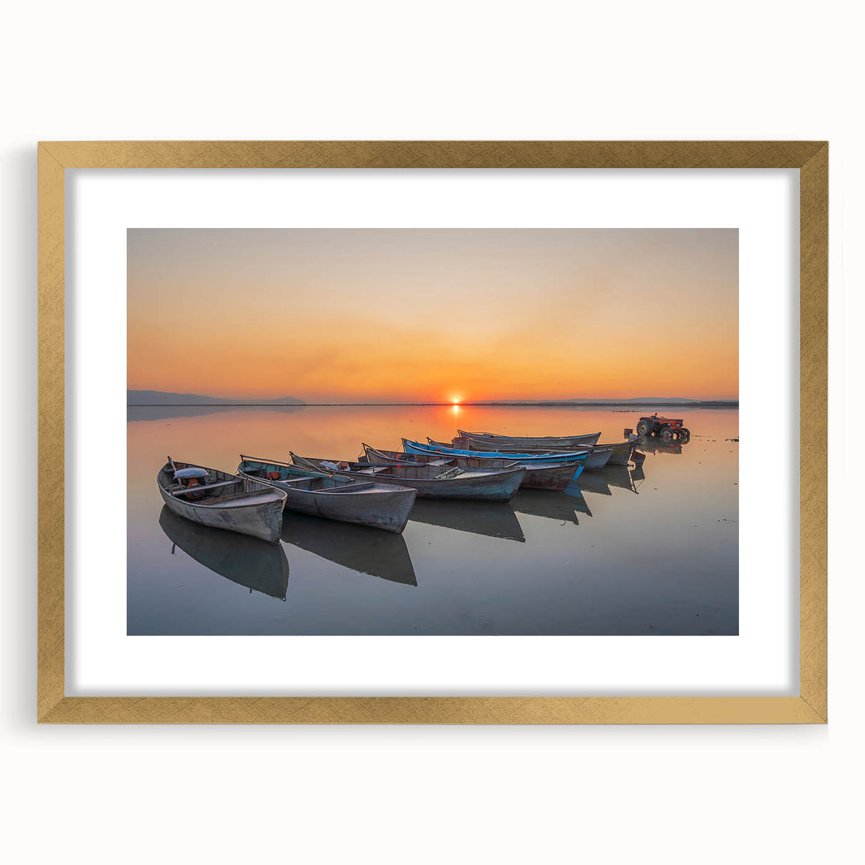 Abstract art print of the Mediterranean Sea in serene blue tones, framed in gold, suitable for bedroom or dining room decor.