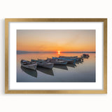 Abstract art print of the Mediterranean Sea in serene blue tones, framed in gold, suitable for bedroom or dining room decor.