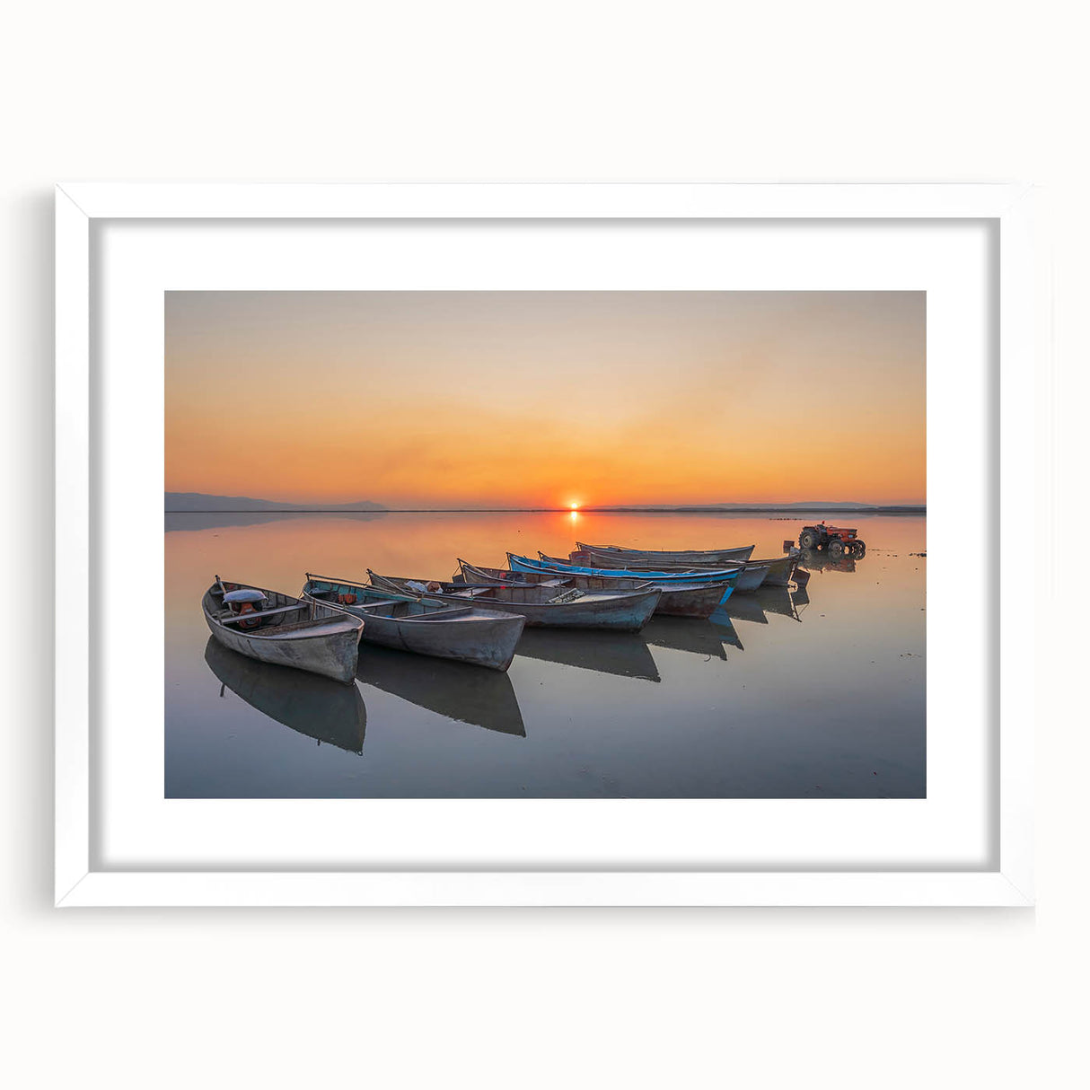 Textured art print depicting an abstract Mediterranean seascape in muted blue and white tones, framed with a white mat.
