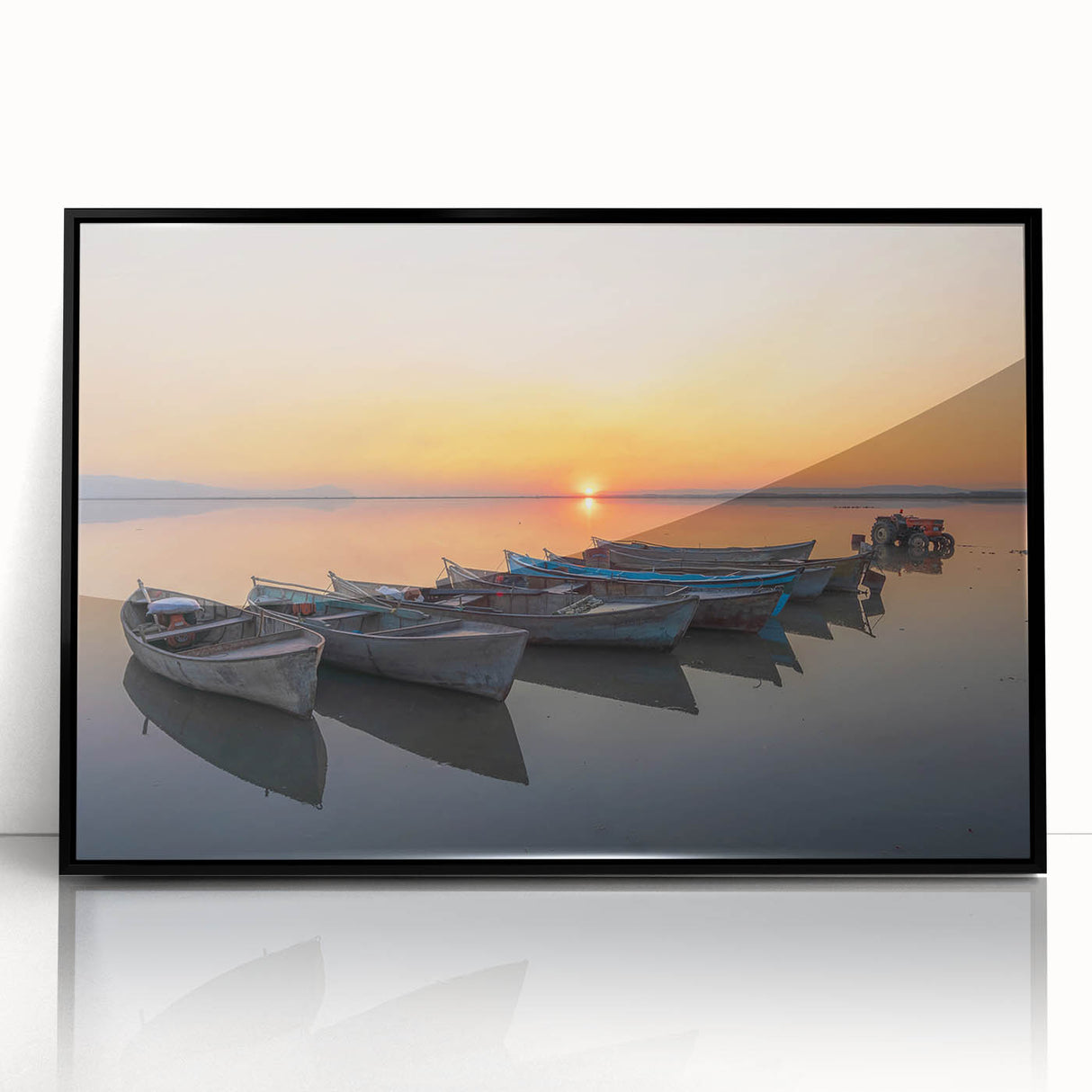 Large abstract wall art depicting the Mediterranean Sea in muted blue and white tones, framed in black acrylic.