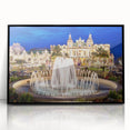 Large abstract wall art featuring a stylized Monaco scenery in muted blues and grays, framed in black acrylic.