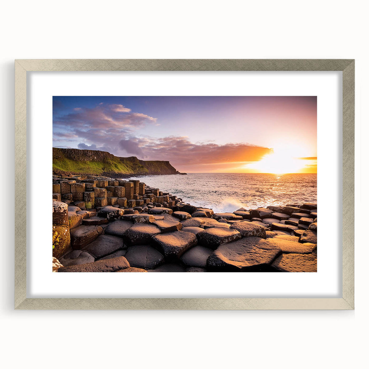 Extra large abstract art print of a textured Northern Ireland scenery in muted greens and blues, framed in silver.
