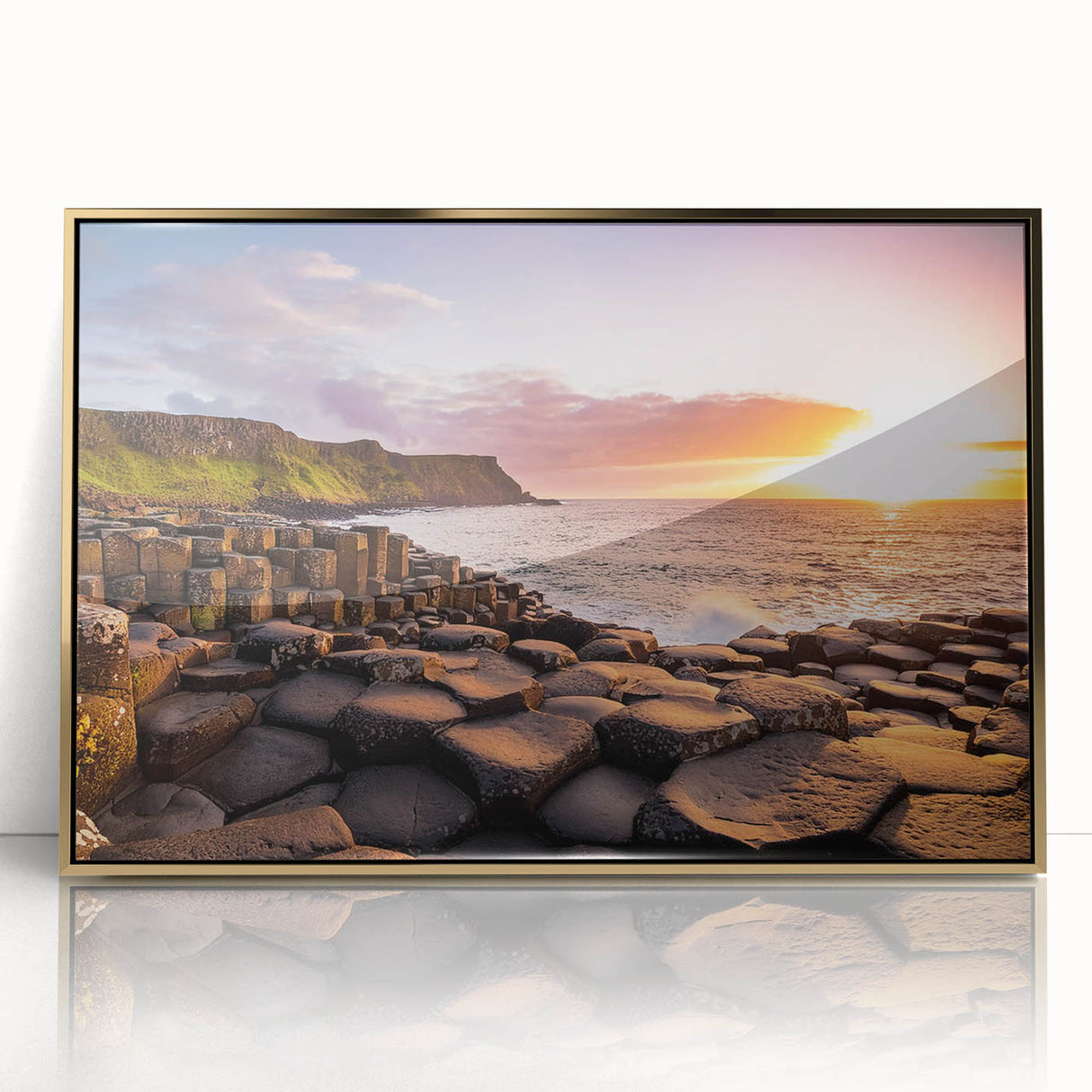 Acrylic print of Northern Ireland scenery with gold frame, featuring muted green and blue tones.