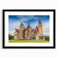 Extra large abstract art print featuring a colorful, textured depiction of a European scenery on a black framed canvas.