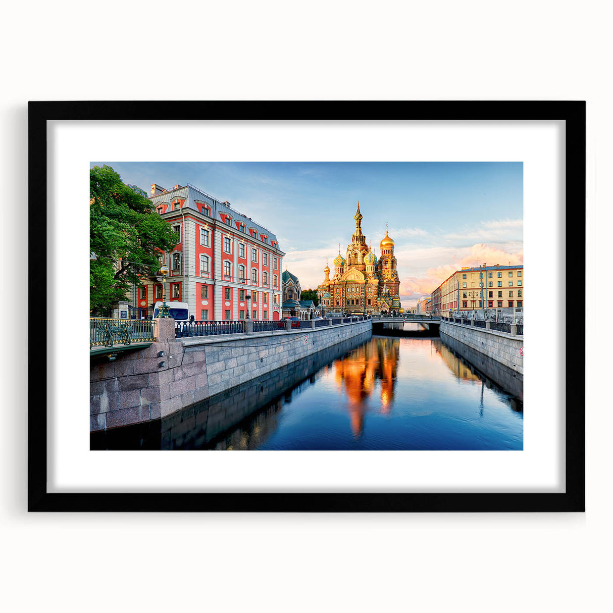 Abstract art print of a colorful, textured Petersburg scenery on a large black-framed canvas, ideal for living room decor.