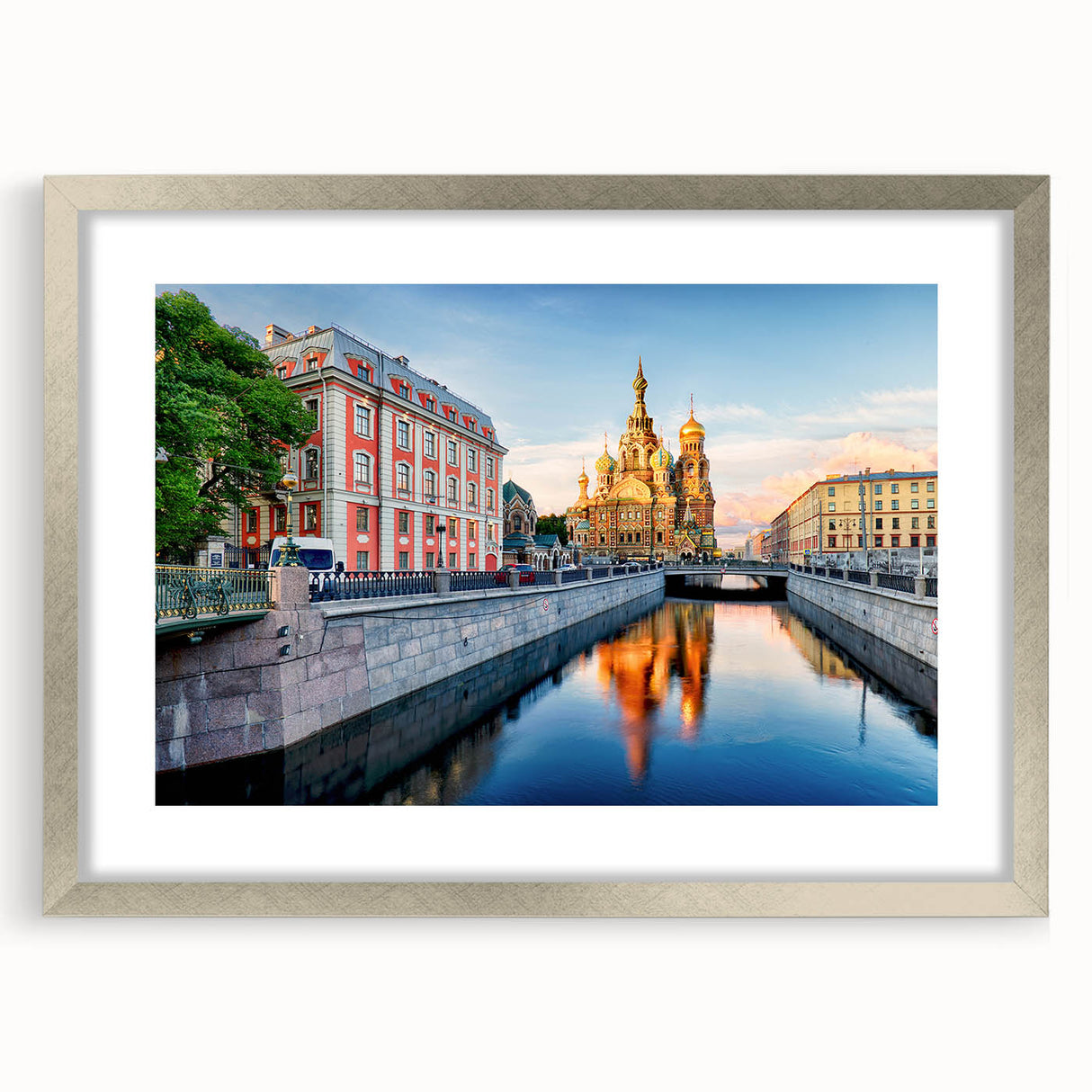 Extra large abstract art print of a textured European cityscape in muted grays and blues, framed in silver.
