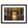 Colorful abstract art print of Andalusian scenery in vibrant hues on a large textured canvas, framed in black.