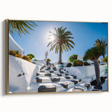 Framed canvas wall art depicting a vintage landscape painting of the Canary Islands, featuring black and gold tones.