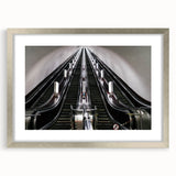 Textured abstract art print depicting a serene European landscape in muted earth tones, framed in silver.