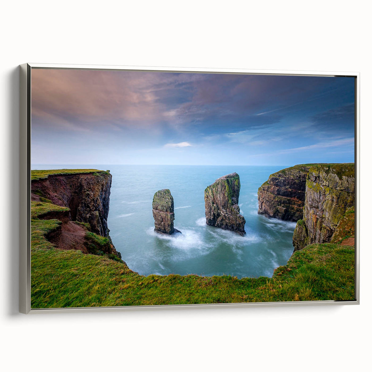 Framed canvas featuring a vintage-style landscape painting of a Welsh scenery in muted earth tones.