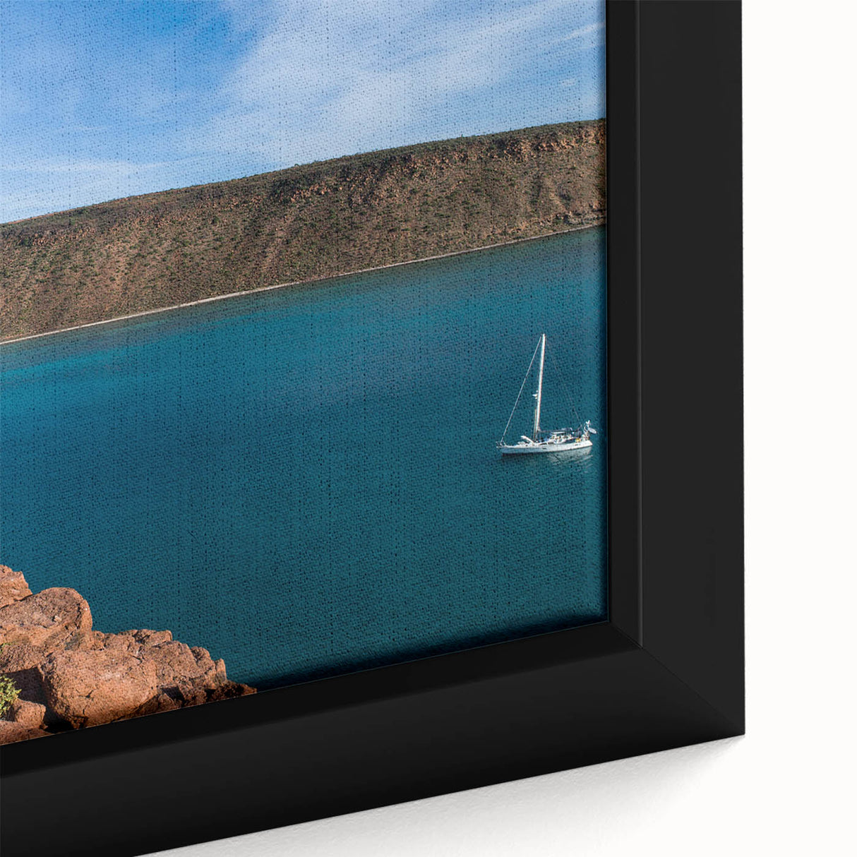 Extra large framed canvas of a textured Baja California scenery in black with colorful accents, ideal for living room decor.