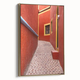 Framed canvas featuring a vintage landscape painting of Guanajuato, Mexico, with muted gold and black tones.