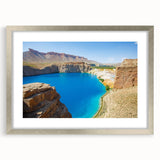 Textured abstract art print depicting a Middle Eastern scenery in muted earth tones on a framed silver mat.