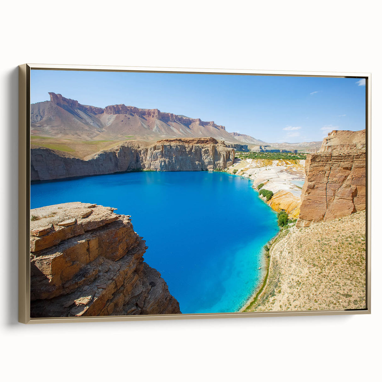 Framed canvas of a vintage-style landscape painting depicting a serene Afghan scenery, using muted earth tones.