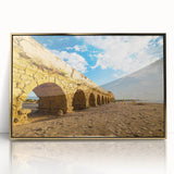 Mid-century modernist art featuring a Middle Eastern landscape in gold tones on a framed acrylic print.