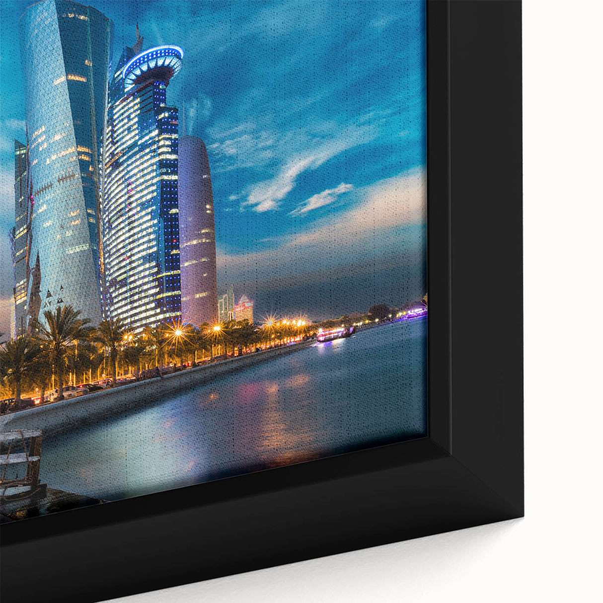 Extra large framed canvas featuring a textured depiction of a Middle Eastern scenery in black with colorful accents.