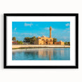 Extra large colorful abstract art print of a textured Saudi Arabian scenery in a black frame, suitable for living room decor.