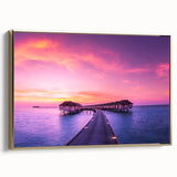 Framed canvas featuring a vintage-style landscape painting of a serene Fiji beach scene with muted blue and sandy hues.