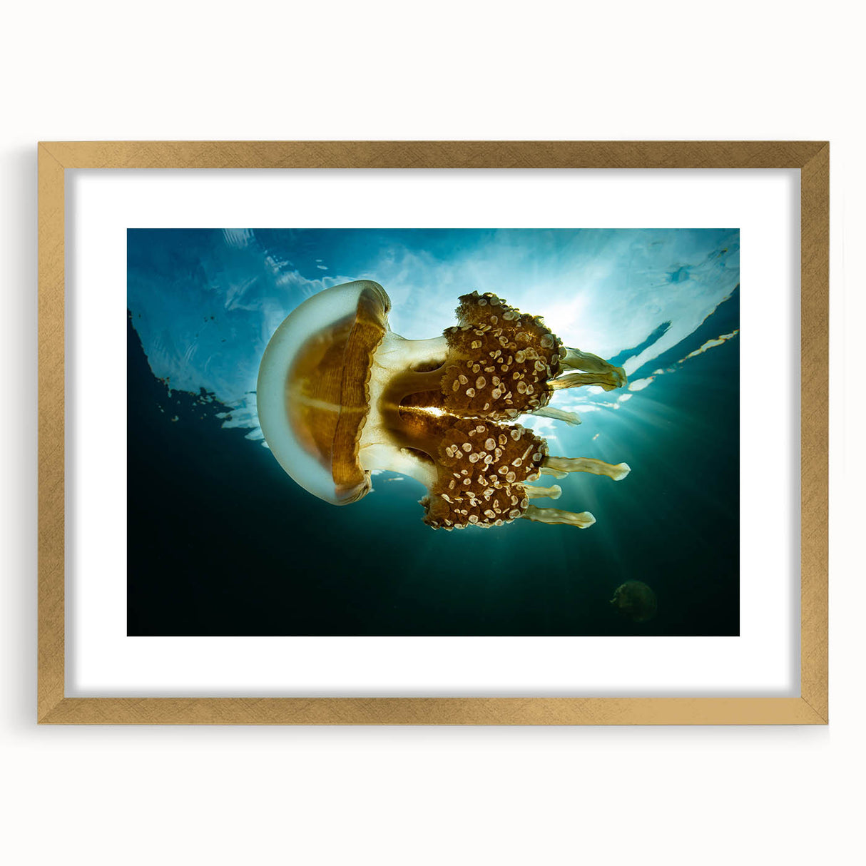 Extra large abstract art print of a textured oceanic scene in muted blue and green hues, framed in gold.