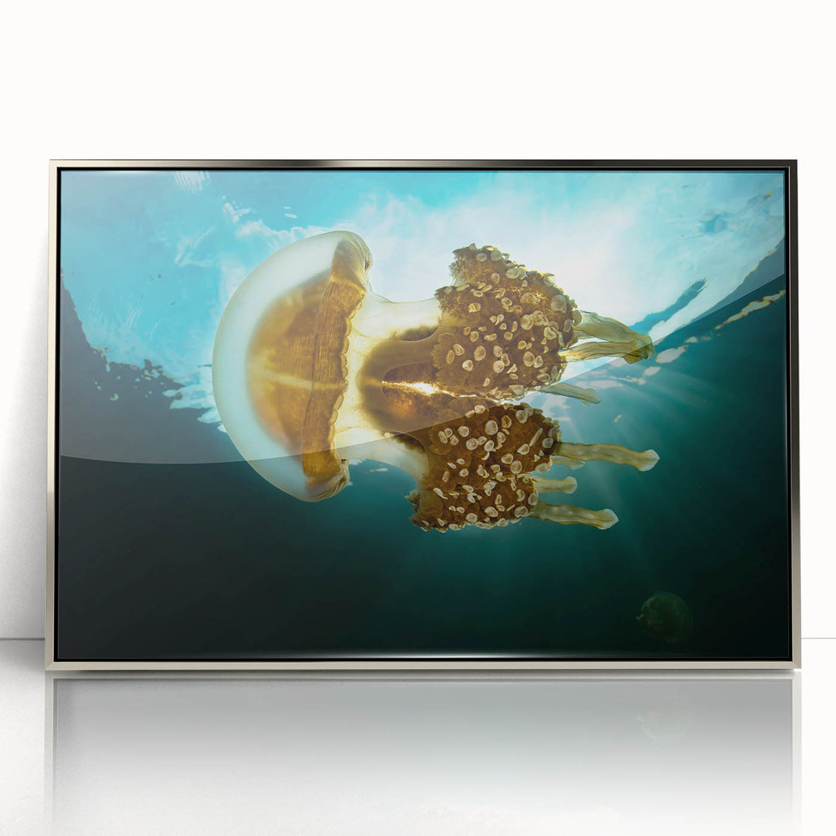 Mid-century modernist art depicting an abstract ocean scene in cool blue and silver tones, framed acrylic print.