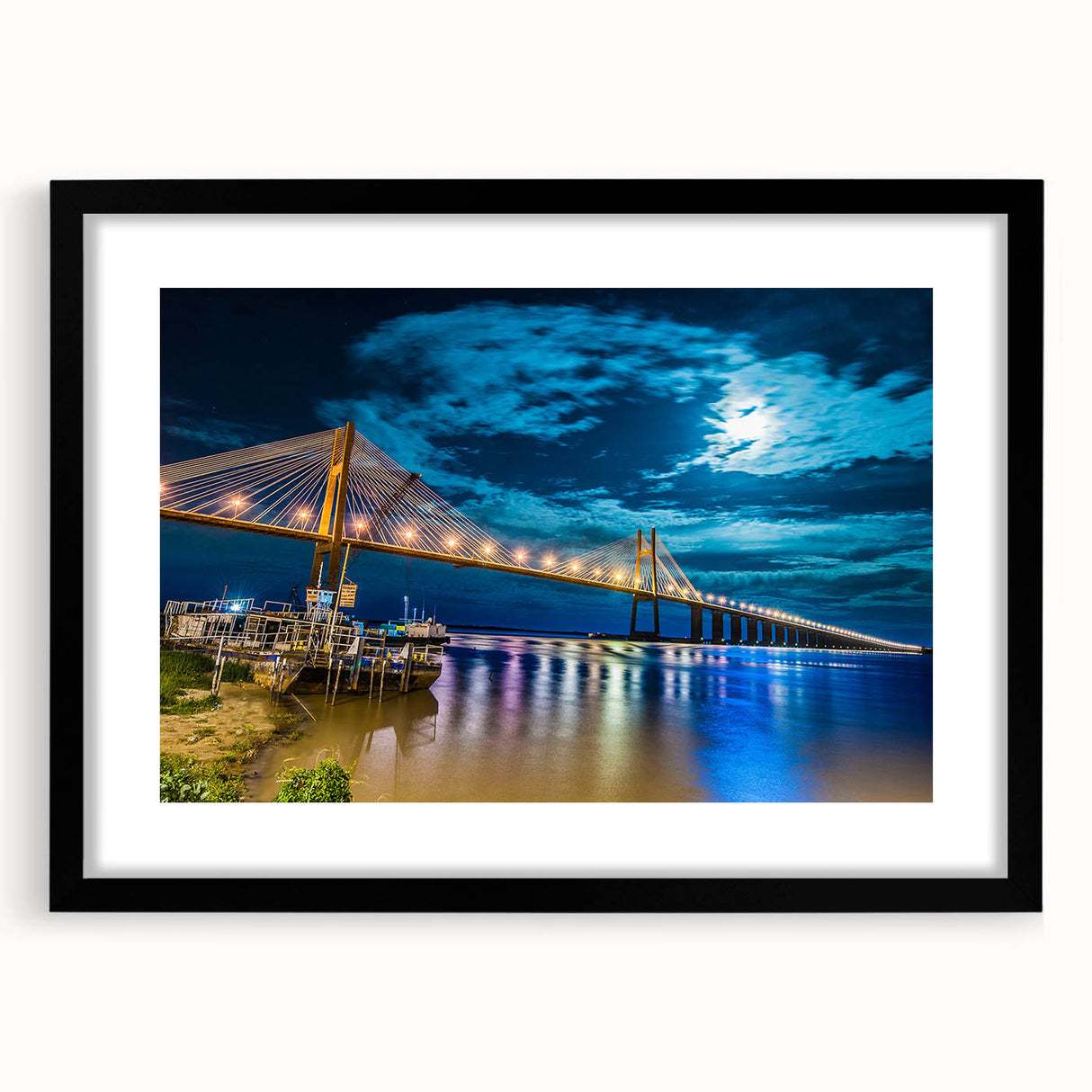 Extra large abstract art print featuring vibrant, colorful scenery of Argentina in a black frame.