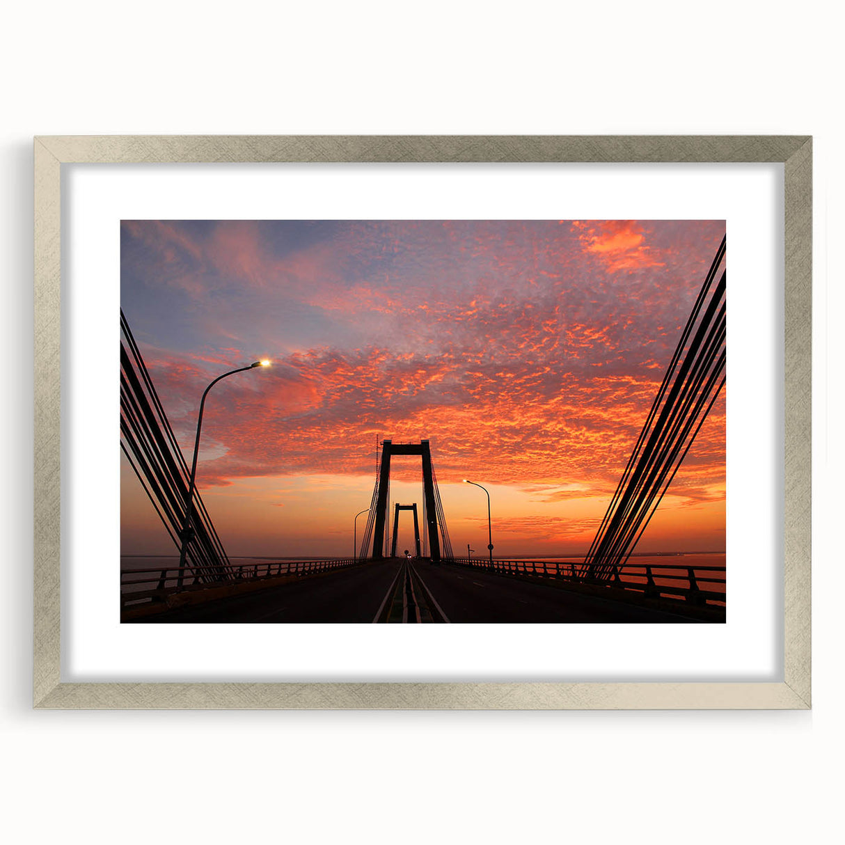 Textured art depicting an abstract Venezuelan landscape in muted earth tones, framed in silver, suitable for bedroom decor.