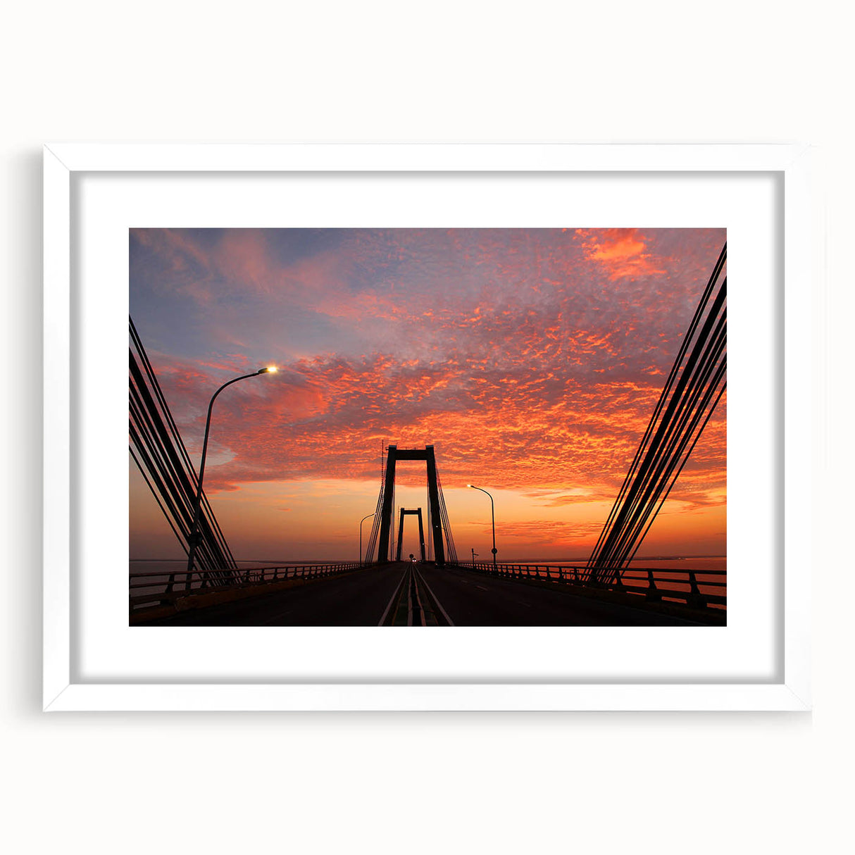 Abstract art print of a stylized Venezuelan landscape in muted earth tones, framed in white.