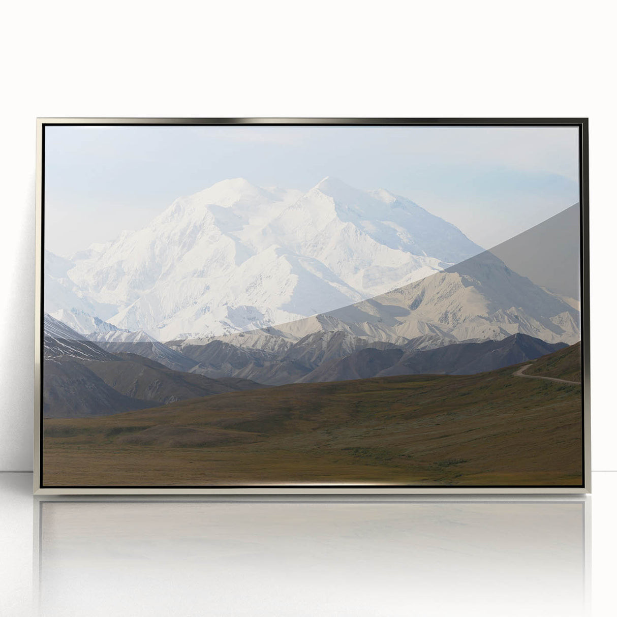 Mid-century modernist art of Denali, Alaska in acrylic print with silver frame, showcasing muted earth tones.