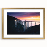 Extra large abstract art print of Big Sur, featuring textured blues and grays, framed in gold, ideal for living room decor.