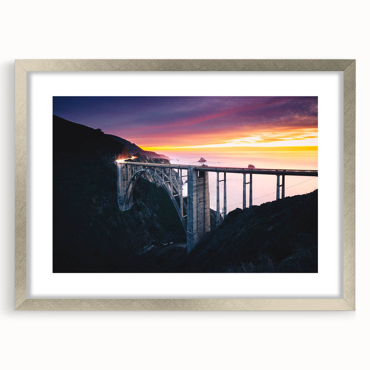 Textured art depicting abstract California Big Sur scenery in silver frame, ideal for bedroom wall decor.