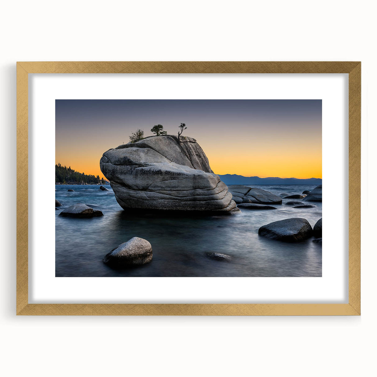 Extra large abstract art print of Lake Tahoe with textured blue and green tones on a gold-framed canvas.