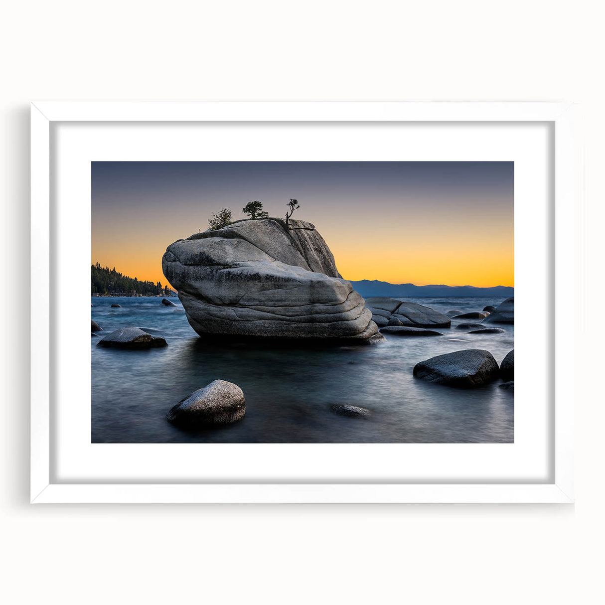Abstract art print of Lake Tahoe in muted blue and green tones on a framed white mat, ideal for dining room decor.