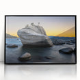 Large abstract wall art of Lake Tahoe in muted blue and green tones, framed in black acrylic.