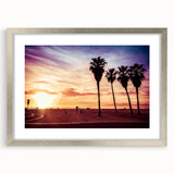 Textured art print depicting an abstract Los Angeles skyline in muted blue tones on a silver-framed canvas.