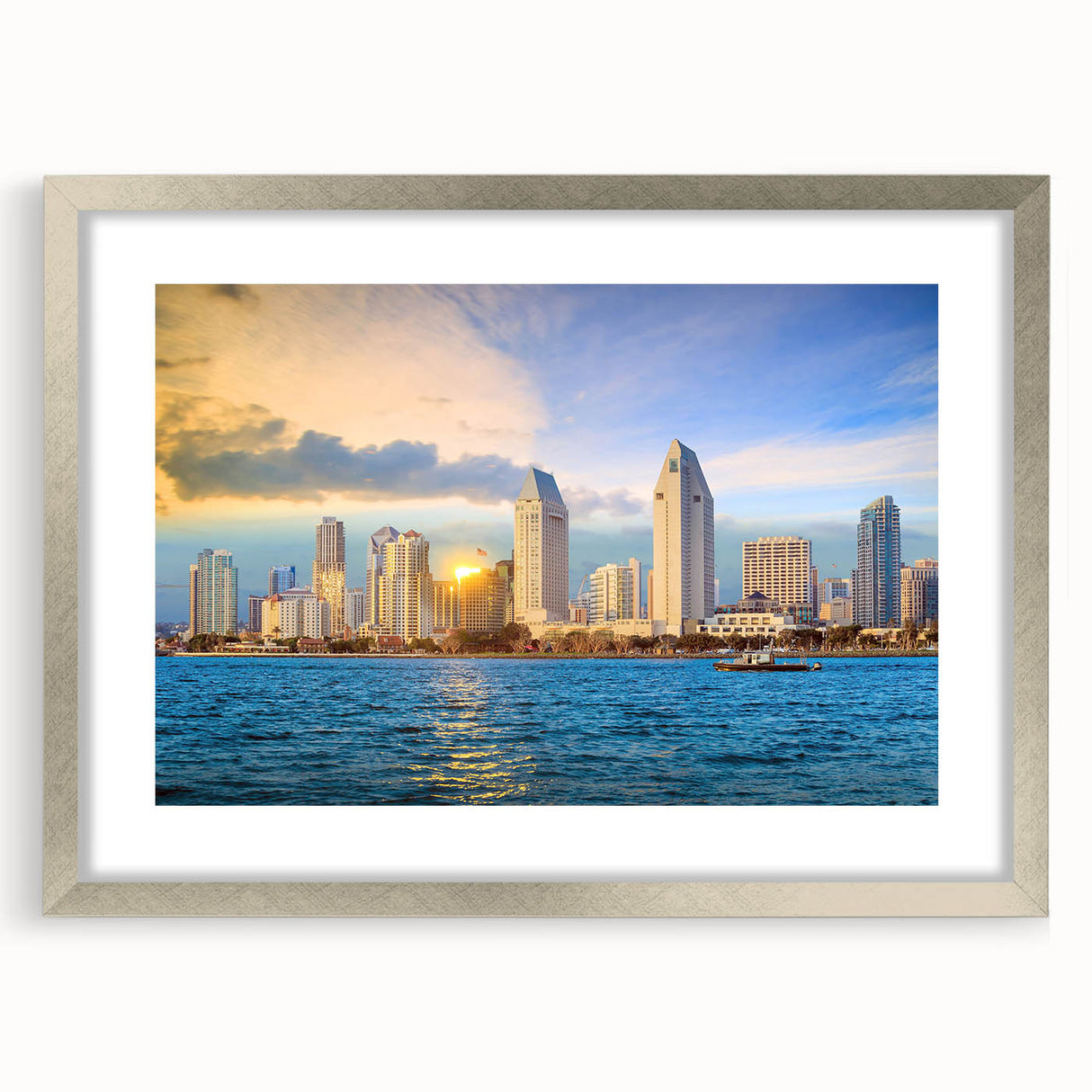 Textured art print of abstract San Diego scenery in muted blues and grays, framed in silver, suitable for bedroom decor.