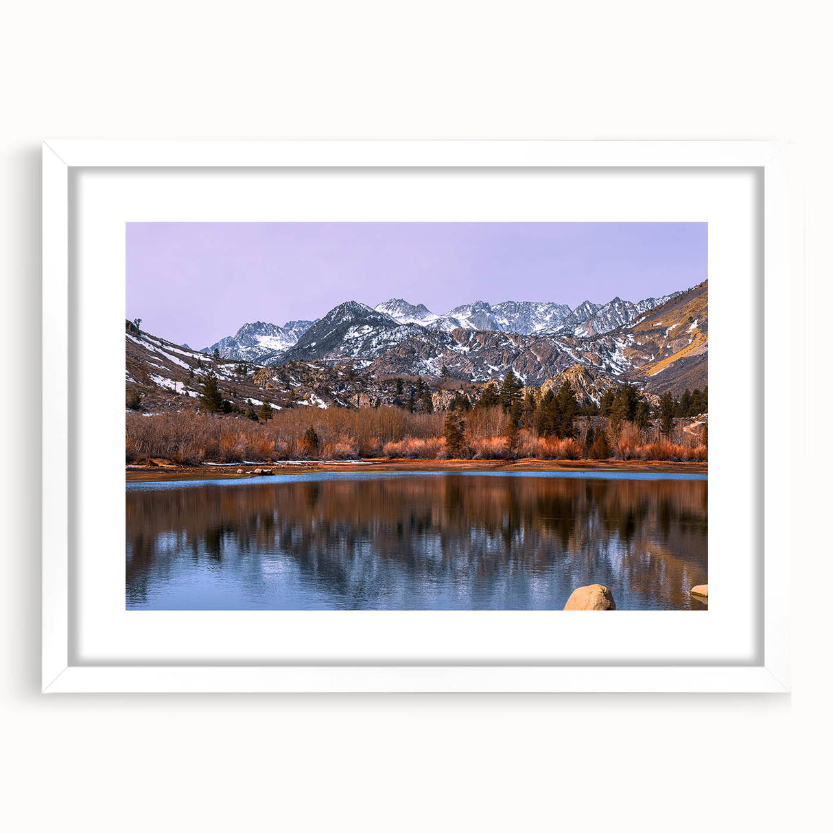 Abstract art print of the Sierra Nevada in muted earth tones, framed with a white mat.