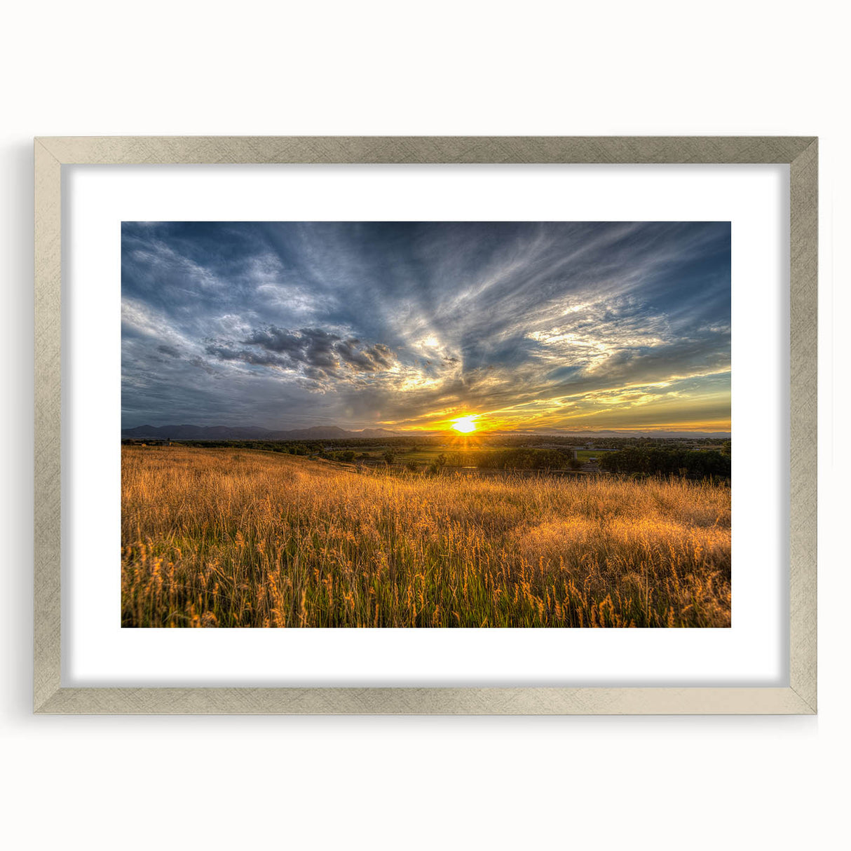 Textured abstract art print of Boulder, Colorado, in muted earth tones on a framed silver mat, suitable for bedroom decor.